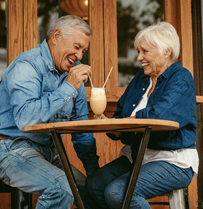 Senior couple on date while wearing dentures in Flint
