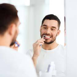 Man brushing his teeth