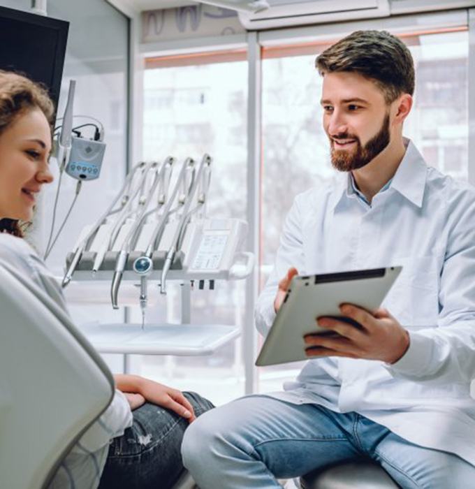 man getting a cone beam scan of his mouth and jaw 