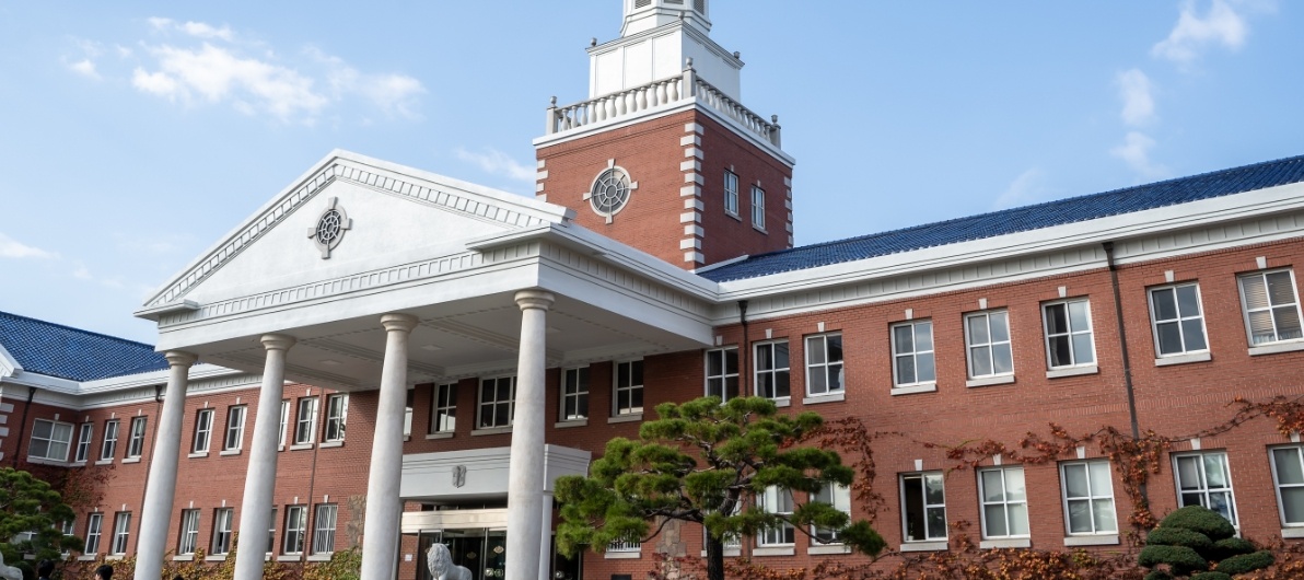 Red brick university building with a clock tower
