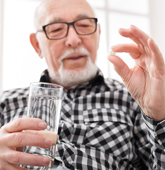 Man taking oral conscious dental sedation pill